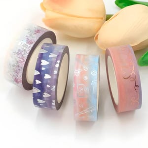 Folie. Frühling 2023 Washi Tape. Schreibtischbedarf. Himmel. Wolken. Sterne. Herzen. Ballerina. Lila Blüten