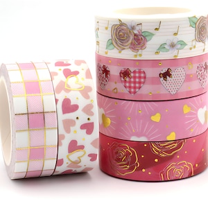 1 rol. Washi-tape. Goudfolie. Liefde. Valentijnsdag. Harten. Geruit. Rozen. Muziek