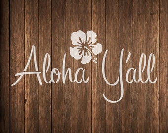 May include: White text on a brown wood background reads "Aloha Y'all" with a white hibiscus flower graphic above the text.