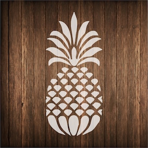 May include: White silhouette of a pineapple on a brown woodgrain background.