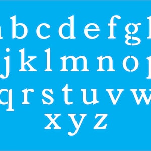 May include: A white alphabet stencil on a bright blue background. The letters are in a classic serif font.