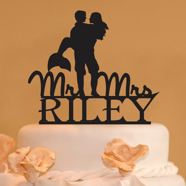 Man holding Mermaid wood wedding cake topper - Mr. & Mrs. mermaid last name cake topper - personalized wedding cake topper