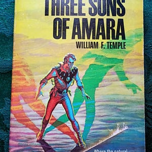 May include: Vintage paperback book cover for "The Three Suns of Amara" by William F. Temple. The cover features a figure in a red and blue spacesuit against a yellow and orange background. Text includes the title and author.
