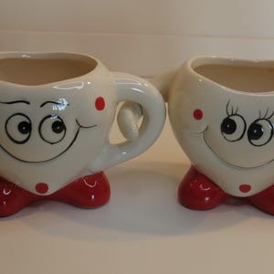 Set Of Sweetheart Little Planters With One Cup Holding The Others Handle Very Sweet As A Gift