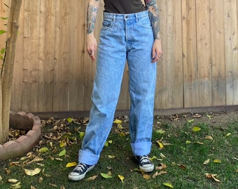 Vintage 1990’s Acid Wash Jeans labeled 33x32