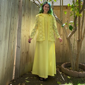 Vintage 1970s bright yellow maxi dress with lace detail on bust. Matching lace long sleeve collared shirt. Medium