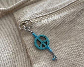 Turquoise peace sign Zipper pull