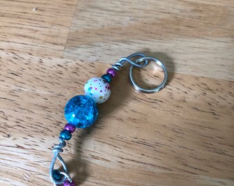 Turquoise and pink zipper pull