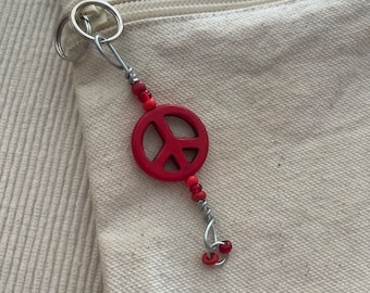 Red peace sign Zipper pull