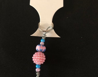 Turquoise and pink zipper pull