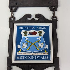 Vintage Cast Iron Tavern Pub Sign Trivet Tile Butchers Arms West Country Ales
