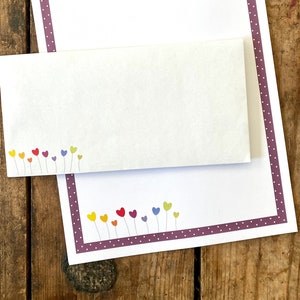 Conjunto de letras flores de corazón