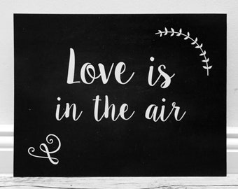 Sign "Love is in the air" // slate