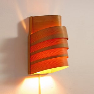Warm and cosy wooden Scandinavian chalet style fifties wall lamp designed by Hans Agne Jakobsson