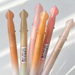 May include: A collection of six pastel-colored pens. The pens have a unique, decorative top and a gradient color scheme, transitioning from a darker shade at the top to a lighter shade at the bottom. Each pen has a small metal clip.