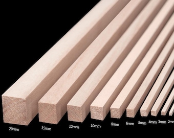 May include: Assortment of wooden dowels in various sizes, ranging from 20mm to 2mm in diameter. The dowels are arranged in a row from largest to smallest, with the ends of each dowel visible.
