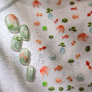 4 Sheets Goldfish Nail Stickers – Embossed Koi Fish, Lotus Leaf & Water Ripples Nail Art Decals for Zen Summer Nail Designs