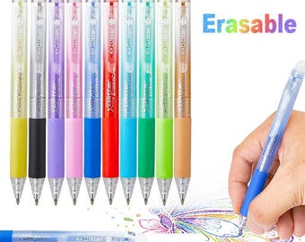 May include: A set of ten glitter gel pens in yellow, black, purple, pink, blue, red, light blue, teal, green, and orange, each featuring a white eraser tip and the text "Glitter" and "Erasable" printed on the clear plastic barrel.