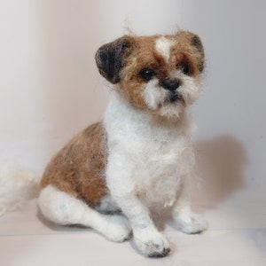 Needle felted dog replica sculpture from wool. White brown wool colors.