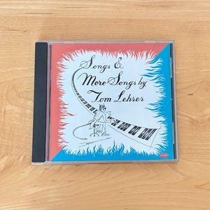 May include: A rustic wooden sign with the text "Welcome to our home" in white lettering. The sign features a distressed finish and a simple, inviting design, perfect for entryway decor.