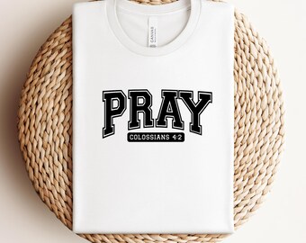 Camiseta cristiana universitaria "ORA" Colosenses 4:2, ropa basada en la fe