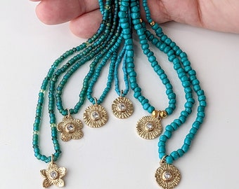 Charm necklace, turquoise seed beads and handmade charm