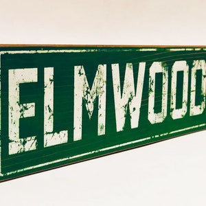 Elmwood Ave wooden sign