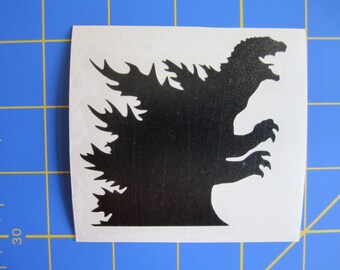 Adesivo/decalcomania a forma di testa di Godzilla 3X3 o 6x6