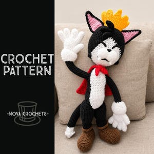 May include: A crochet pattern for a stuffed cat toy featuring the text CROCHET PATTERN and NOVA CROCHETS. The cat is black and white with a yellow crown, pink inner ears, a red cape, and brown boots, depicted with one white gloved hand raised.