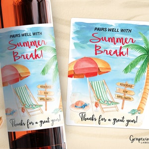 May include: A wine bottle label with a beach scene featuring a beach chair, an umbrella, and a palm tree. The text on the label reads "Pairs well with Summer Break!" and "Thanks for a great year!"