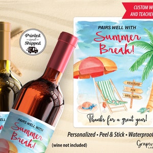 May include: Two wine bottles with personalized labels that say "Pairs well with Summer Break!" The labels feature a watercolor design of a beach scene with a palm tree, beach chair, and umbrella. The text "Thanks for a great year!" is also on the label.