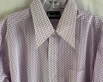 May include: A white and purple patterned long-sleeve shirt with a button-down collar. The shirt has a pocket on the left side and a "Branford" label on the collar.