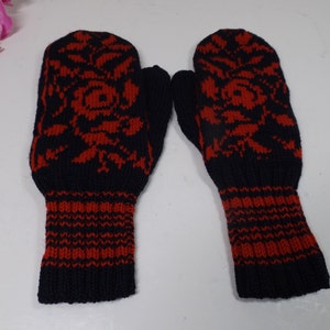 Women's mittens.The mittens for small hands or for girl hands. girls knitted mittens. Cozy Red roses on dark blue background.New old stock,