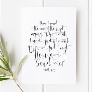 May include: A white card with black calligraphy text that reads "Then I heard the voice of the Lord saying, 'Whom shall I send?' And who will go for us?' And I said, 'Here am I. Send me!'"  Isaiah 6:8
