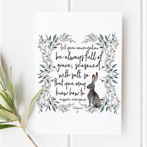 May include: A watercolor illustration of a rabbit with a quote from the Bible, Colossians 4:6, "Let your conversation be always full of grace, seasoned with salt, so that you may know how to answer everyone."