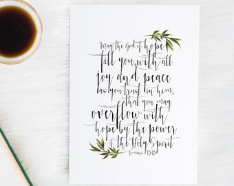 May include: A white printable art print with a black and green floral design and the text "May the god of hope fill you with all joy and peace as you trust in him, that you may overflow with hope by the power of the Holy Spirit. Romans 15:13"
