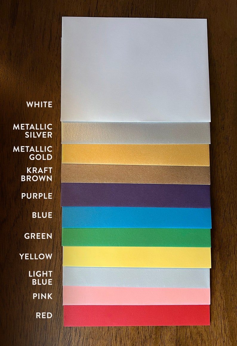 May include: A collection of 14 different colored cardstock paper samples, including white, metallic silver, metallic gold, kraft brown, purple, blue, green, yellow, light blue, pink, and red.