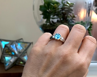 Blue topaz ring