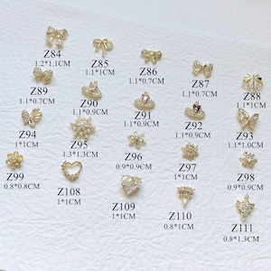 1PC Luxury Gold Zircon Stone Different Shapes Butterfly Snowflake Heart Flower Bow Deco Metal Charms Metal Deco Charms Nail Art Z84-111
