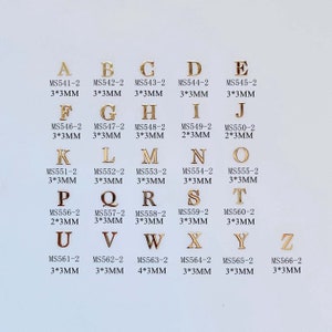 100 peças de metal macio dourado para arte em unhas, adesivo não adesivo, fatias de metal, letras do alfabeto diferentes MS541-566