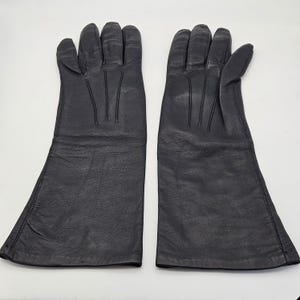 Lange Damen Handschuhe aus dunkelblauem Leder mit Ziernähten