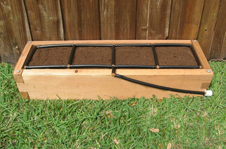 1x4 Garden Grid\u2122 watering system Garden Irrigation System and Planting Grid in one