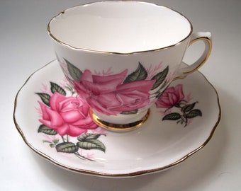 Colclough  Tea Cup and Saucer, White tea cup and saucer set with Large Pink Rose.