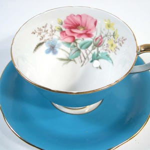 Vintage Aynsley Turquoise Floral Tea Cup and Saucer: Gold Trim, 1939+