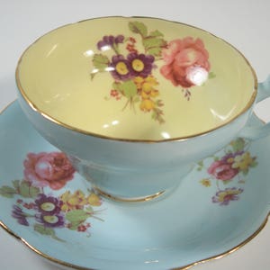 Blue Foley Tea Cup and Saucer, Brushed Gold Rims with pink roses and flowers tea cup and saucer set.