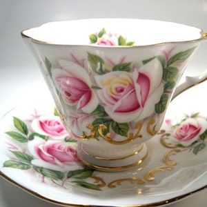 Queen Anne Tea Cup and Saucer: Pink Roses, Gold Scroll, England
