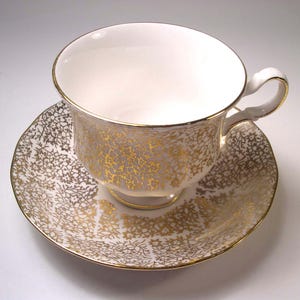 Vintage Queen Anne  White & Gold Tea Cup And Saucer.