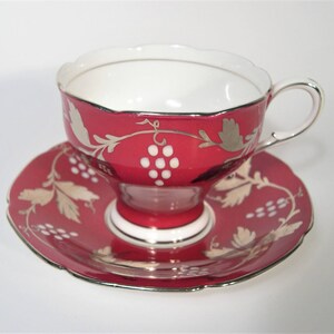 Paragon Tea Cup and Saucer,   Magenta tea cup and saucer set, Antique  Paragon tea cup set with hand painted Grapes and Silver Leaves.