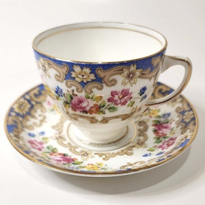 Old Royal Tea Cup and Saucer, Royal Blue and Flowers  tea cup and saucer set.
