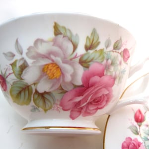 Royal Grafton Tea Cup and Saucer, White Tea Cup and Saucer with White and Pink Roses.
